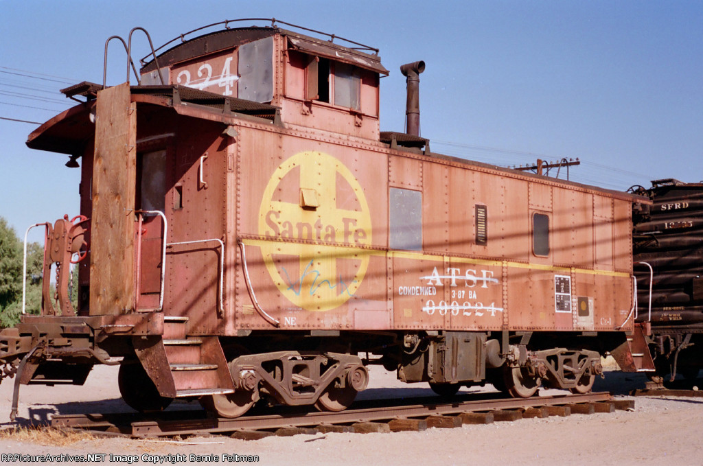 Santa Fe caboose #999224, on display west of depot,  